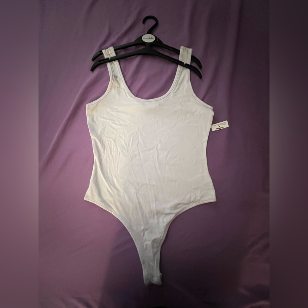 Brand new white onesie !
